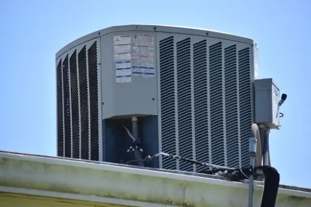 Rooftop HVAC unit serviced by M&H